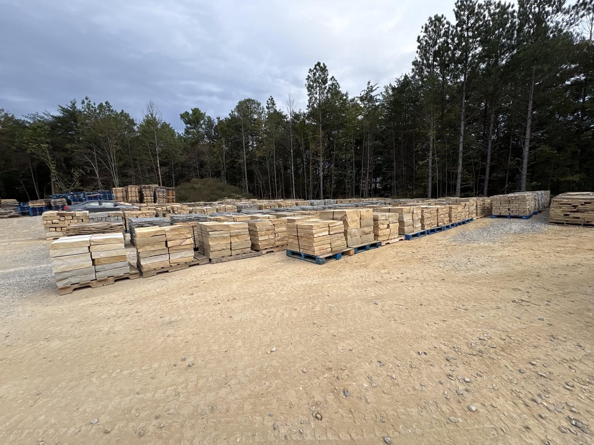 Stacked Tennessee stone pallets at the Deer Creek Stone quarry yard in Graysville, TN
